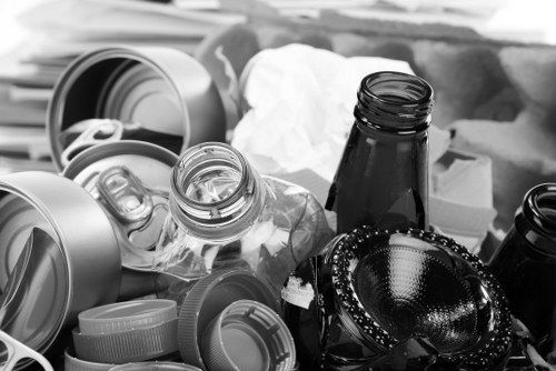 Workers loading items into van for flat clearout